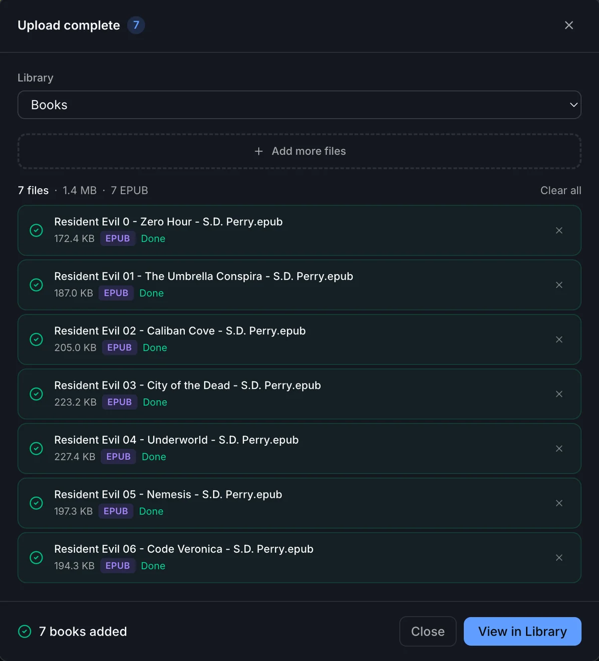 Upload dialog showing all books successfully added