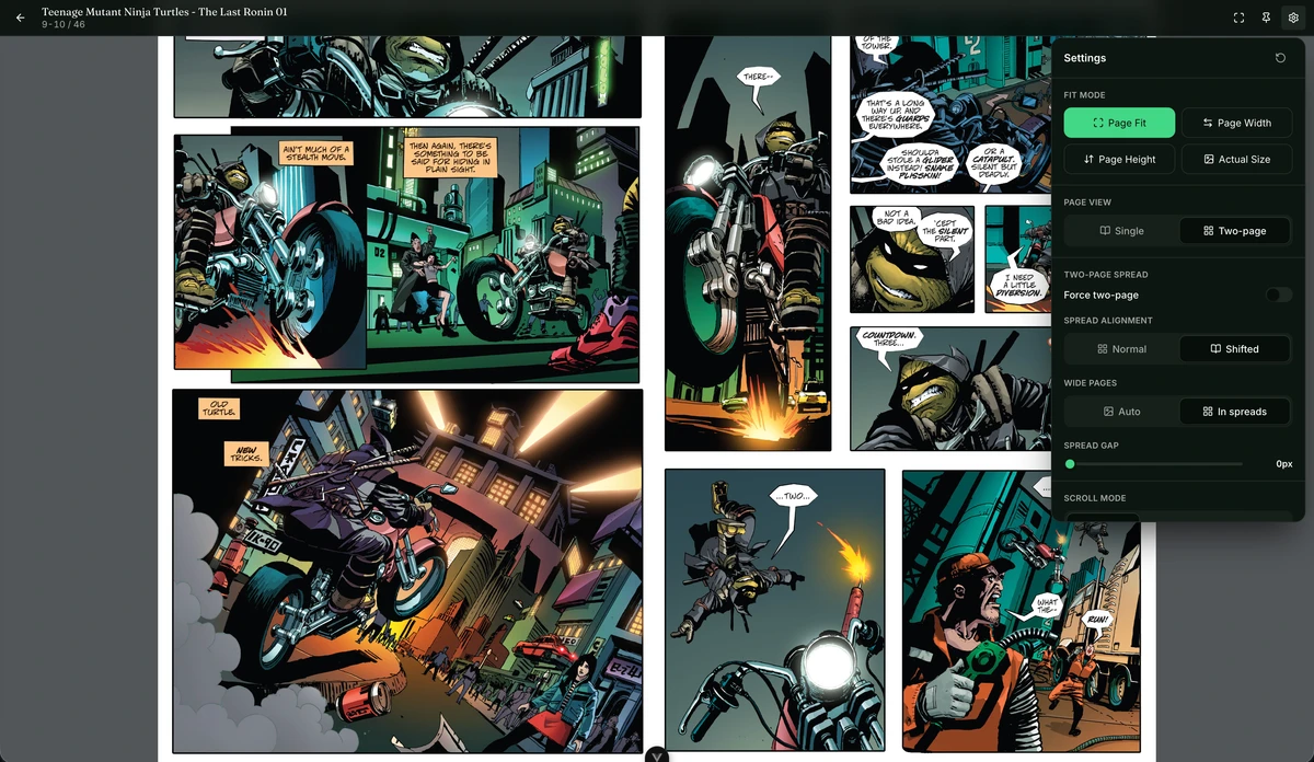 The comics reader on a two-page spread with the settings panel open on fit mode, page view, and spread alignment
